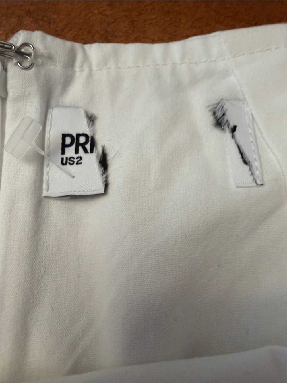 Princess Polly white low rise Gigi skort. - Picture 2 of 7